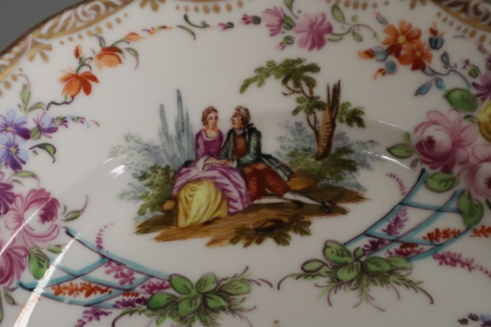 An 18th century Tournay or Arras moulded plate and a 19th century Meissen plate